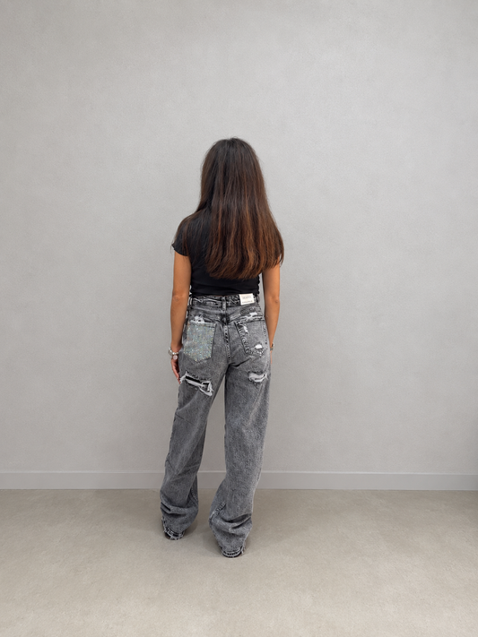 Jeans tasca argentata